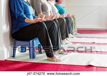 Four pregnant ladies in a pre natal yoga class View Large Photo Image Stock Image - Four pregnant ladies in a pre natal yoga class. Fotosearch