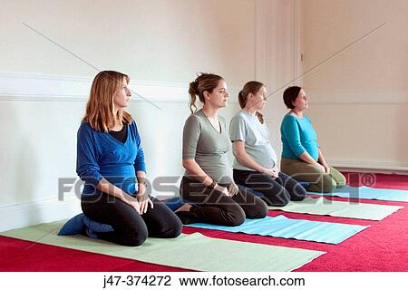 Four pregnant ladies in a pre natal yoga class View Large Photo Image Stock Image - Four pregnant ladies in a pre natal yoga class. Fotosearch