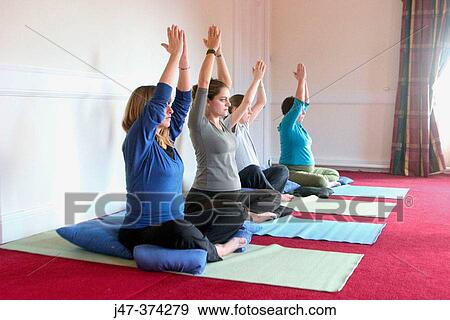 Four pregnant ladies in a pre natal yoga class View Large Photo Image Stock Photo - Four pregnant ladies in a pre natal yoga class. Fotosearch