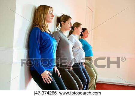 Four pregnant ladies in a pre natal yoga class View Large Photo Image Stock Photograph - Four pregnant ladies in a pre natal yoga class. Fotosearch