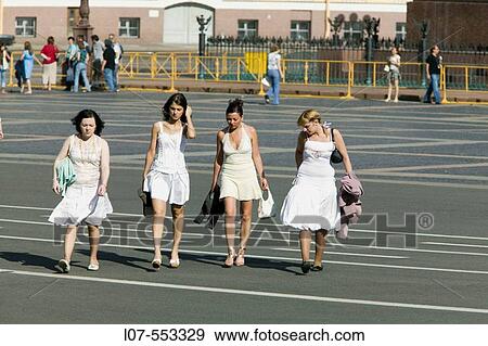 Four women in white dresses on Dvortsovaya Place. St Petersburg. Russia View Large Photo Image Stock Photo - Four women in white dresses on Dvortsovaya Place. St Petersburg. Russia. Fotosearch