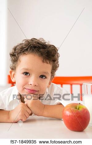 Four year old boy with milk and fruit for beakfast View Large Photo Image Stock Photography - Four year old boy with milk and fruit for beakfast. Fotosearch