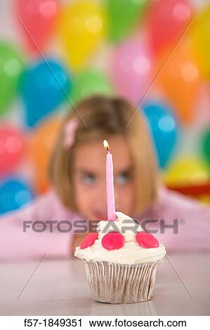Four year old girl celebrating her birthday View Large Photo Image Stock Image - Four year old girl celebrating her birthday. Fotosearch