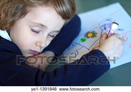Four year old girl falls asleep in the middle of drawing, France View Large Photo Image Stock Photo - Four year old girl falls asleep in the middle of drawing, France. Fotosearch
