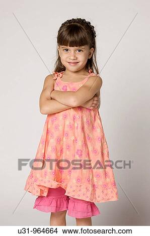 Four year old girl smiling at the camera View Large Photo Image Picture - Four year old girl smiling at the camera. Fotosearch