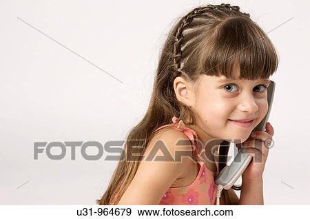Four year old twins talking on the phone View Large Photo Image Stock Photo - Four year old twins talking on the phone. Fotosearch