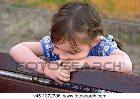Four years old girl thinking. View Large Photo Image Stock Photograph - Four years old girl thinking.. Fotosearch