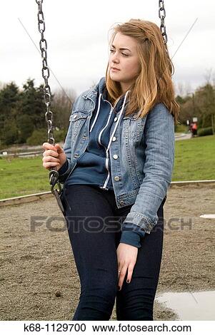 Fourteen year old girl in a playground in Vancouver, BC, Canada View Large Photo Image Stock Image - Fourteen year old girl in a playground in Vancouver, BC, Canada. Fotosearch