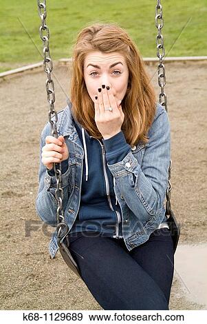 Fourteen year old girl in a playground in Vancouver, BC, Canada View Large Photo Image Stock Photo - Fourteen year old girl in a playground in Vancouver, BC, Canada. Fotosearch