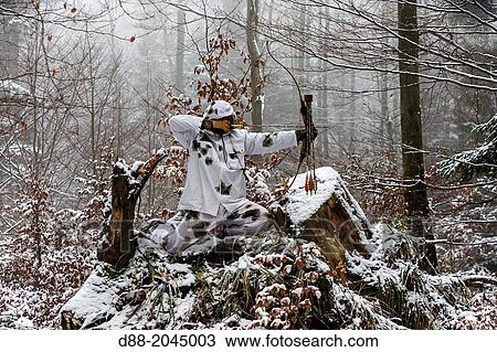Stock Image - France, Alsace, Bas Rhin, Hunting Bow Archery in winter in winter dress.. Fotosearch
