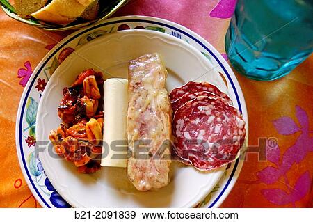 France. Aquitaine. Dordogne. Food.: "Salade de fruits de mer", "coeur de palmier", "pied de porc en gel? e" et "saucisson". View Large Photo Image Stock Photo - France. Aquitaine. Dordogne. Food.: "Salade de fruits de mer", "coeur de palmier", "pied de porc en gel? e" et "saucisson".. Fotosearch