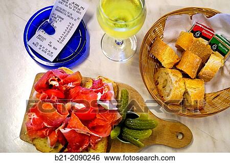 France. Aquitaine. Gironde. Food and wine: "Jambon du pays" (cured ham) with "cornichons" and white wine. View Large Photo Image Stock Photograph - France. Aquitaine. Gironde. Food and wine: "Jambon du pays" (cured ham) with "cornichons" and white wine.. Fotosearch