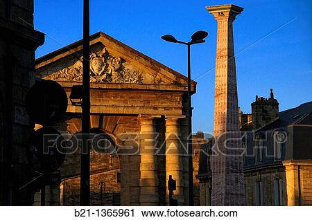 Stock Image - France, Aquitaine, Gironde, On Place de la Victoire at Bordeaux: Gate of the town and modern obelisque.. Fotosearch