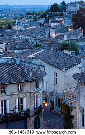 Stock Photo - France, Aquitaine Region, Gironde Department, St-Emilion, wine town, elevated town view, dusk. Fotosearch