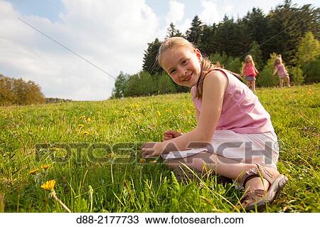 France, Bas Rhin, Urbeis near the Climont, girl in a meadow. View Large Photo Image Stock Image - France, Bas Rhin, Urbeis near the Climont, girl in a meadow.. Fotosearch