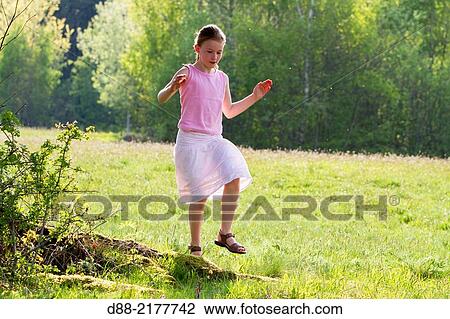 France, Bas Rhin, Urbeis near the Climont, girl in a meadow. View Large Photo Image Stock Image - France, Bas Rhin, Urbeis near the Climont, girl in a meadow.. Fotosearch