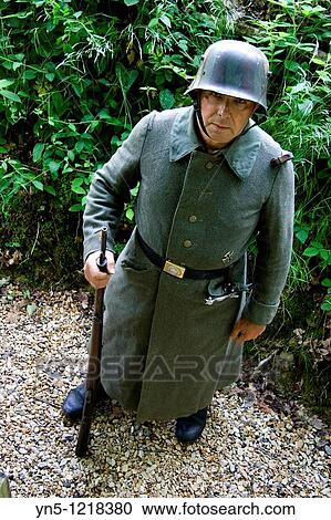 Stock Image - France, Champagne-Ardenne, Marne 51, Vienne le Chateau - Camp de la Vall? e Moreau - recontitution and remnants of a german camp of the First Worl War - German soldier in uniform. Fotosearch