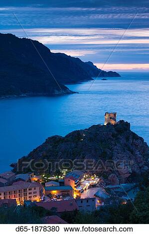 France, Corsica, Corse-du-Sud Department, Calanche Region, Porto, elevated view of town and Genoese tower, dusk View Large Photo Image Stock Image - France, Corsica, Corse-du-Sud Department, Calanche Region, Porto, elevated view of town and Genoese tower, dusk. Fotosearch