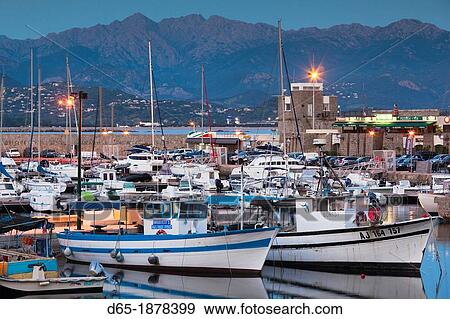 France, Corsica, Corse-du-Sud Department, Corsica West Coast Region, Ajaccio, city view from Port Tino Rossi, dusk View Large Photo Image Stock Photo - France, Corsica, Corse-du-Sud Department, Corsica West Coast Region, Ajaccio, city view from Port Tino Rossi, dusk. Fotosearch