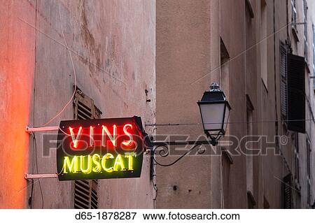 France, Corsica, Haute-Corse Department, La Balagne Region, Ile Rousse, neon sign for Muscat wines View Large Photo Image Stock Photo - France, Corsica, Haute-Corse Department, La Balagne Region, Ile Rousse, neon sign for Muscat wines. Fotosearch