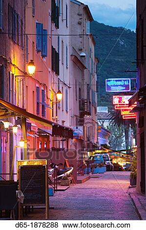 France, Corsica, Haute-Corse Department, La Balagne Region, Ile Rousse, outdoor cafes, dusk, NR View Large Photo Image Stock Photo - France, Corsica, Haute-Corse Department, La Balagne Region, Ile Rousse, outdoor cafes, dusk, NR. Fotosearch