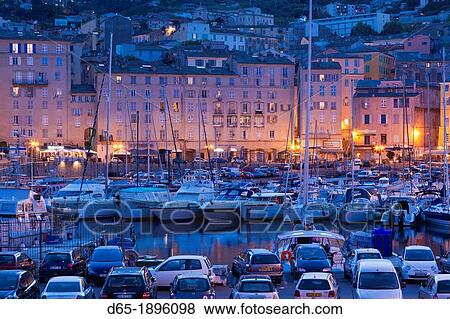 France, Corsica, Haute-Corse Department, Le Cap Corse, Bastia, Old Port, dusk View Large Photo Image Stock Photo - France, Corsica, Haute-Corse Department, Le Cap Corse, Bastia, Old Port, dusk. Fotosearch