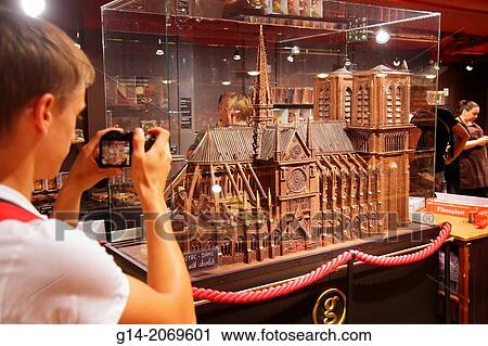 France, Europe, French, Paris, 18th arrondissement, Montmatre, Place Saint St. Pierre, Rue de Steinkerque, shopping, Maison Georges Larnicol, chocolates, desserts, sweets, Notre Dame Cathedral, model, miniature, chocolate, teen, boy, taking picture,. View Large Photo Image Stock Image - France, Europe, French, Paris, 18th arrondissement, Montmatre, Place Saint St. Pierre, Rue de Steinkerque, shopping, Maison Georges Larnicol, chocolates, desserts, sweets, Notre Dame Cathedral, model, miniature, chocolate, teen, boy, taking picture,.. Fotosearch