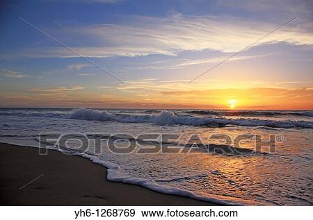 France, Gironde, Montalivet-les-Bains, sunset at Atlantic Ocean View Large Photo Image Stock Photo - France, Gironde, Montalivet-les-Bains, sunset at Atlantic Ocean. Fotosearch
