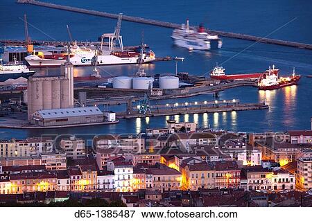 France, Languedoc-Roussillon, Herault Department, Sete, port overview from Mont St-Clair, dusk View Large Photo Image Stock Photo - France, Languedoc-Roussillon, Herault Department, Sete, port overview from Mont St-Clair, dusk. Fotosearch