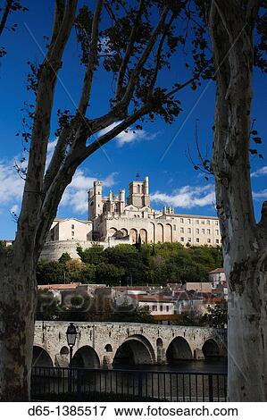 France, Languedoc-Roussillon, Herault Department, Beziers, Cathedrale St-Nazaire cathedral and the Pont Vieux bridge View Large Photo Image Stock Photo - France, Languedoc-Roussillon, Herault Department, Beziers, Cathedrale St-Nazaire cathedral and the Pont Vieux bridge. Fotosearch