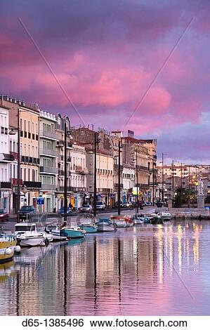 France, Languedoc-Roussillon, Herault Department, Sete, Old Port waterfront, dawn View Large Photo Image Stock Photograph - France, Languedoc-Roussillon, Herault Department, Sete, Old Port waterfront, dawn. Fotosearch
