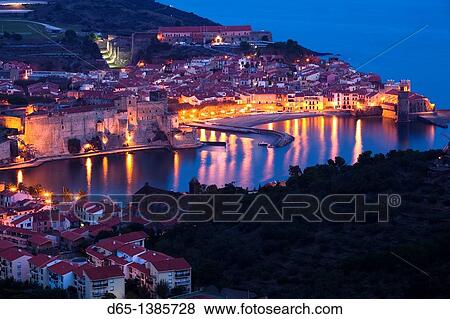 France, Languedoc-Roussillon, Pyrennes-Orientales Department, Vermillion Coast Area, Collioure, town overview, dawn View Large Photo Image Stock Photo - France, Languedoc-Roussillon, Pyrennes-Orientales Department, Vermillion Coast Area, Collioure, town overview, dawn. Fotosearch