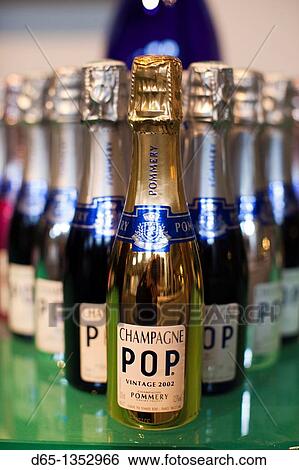 Stock Photograph - France, Marne, Champagne Ardenne, Reims, Pommery champagne winery, detail of champagne bottle. Fotosearch