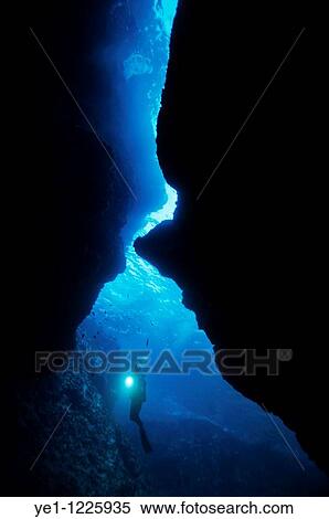 France marseille arc en ciel cave scuba diver shining a flashlight underwater View Large Photo Image Stock Photography - France marseille arc en ciel cave scuba diver shining a flashlight underwater. Fotosearch