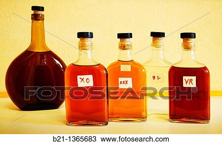 Stock Image - France, Midi Pyren? es, Gers, Small bottles of control at the Samalens Armagnac Estate XO, Three stars, Blanche and Very Rare Armagnacs. Fotosearch