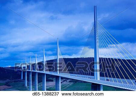 France, Midi-Pyrenees Region, Aveyron Department, Millau, Millau Viaduct Bridge, dusk View Large Photo Image Stock Photo - France, Midi-Pyrenees Region, Aveyron Department, Millau, Millau Viaduct Bridge, dusk. Fotosearch