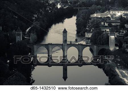 France, Midi-Pyrenees Region, Lot Department, Cahors, Pont Valentre, midieval bridge, Lot River, dusk, elevated view View Large Photo Image Stock Image - France, Midi-Pyrenees Region, Lot Department, Cahors, Pont Valentre, midieval bridge, Lot River, dusk, elevated view. Fotosearch