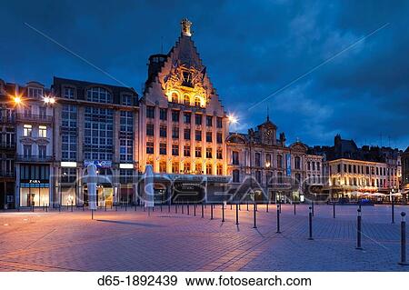 France, Nord-Pas de Calais Region, Nord Department, French Flanders Area, Lille, Grand Place-Place General de Gaulle, La Voix du Nord newspaper building, dusk View Large Photo Image Stock Photo - France, Nord-Pas de Calais Region, Nord Department, French Flanders Area, Lille, Grand Place-Place General de Gaulle, La Voix du Nord newspaper building, dusk. Fotosearch