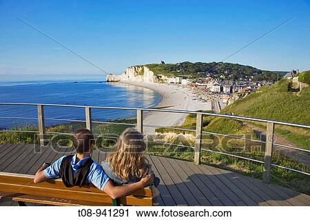 Stock Image - france, normandie, etretat: plage, falaise d? amont: couple. Fotosearch