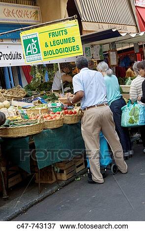 France. Paris. Food market at Place d? Aligre. The covered Marche Beauvau (open since 1777) and an open-air market in the surrounding square with produce as well as flea-market stalls. Aligre is both well supplied and typically Parisian. View Large Photo Image Stock Photo - France. Paris. Food market at Place d? Aligre. The covered Marche Beauvau (open since 1777) and an open-air market in the surrounding square with produce as well as flea-market stalls. Aligre is both well supplied and typically Parisian.. Fotosearch