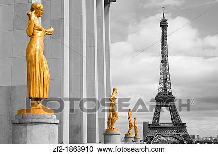 Stock Image - France, Paris, The Eiffel tower and the statues of the Palais de Chaillot. Fotosearch