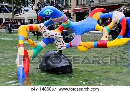 Stock Photo - France, Paris, The Stravinsky Fountain located in Place Stravinsky, between the Centre Pompidou and the Church of Saint-Merri.. Fotosearch