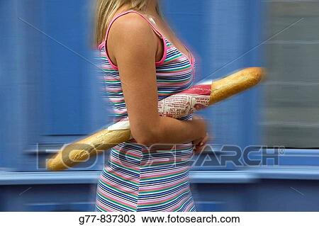 France Provence Sault En Provence Woman with Baguette MODEL RELEASE 1109 View Large Photo Image Stock Image - France Provence Sault En Provence Woman with Baguette MODEL RELEASE 1109. Fotosearch