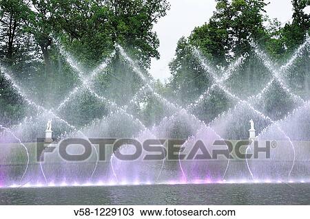 Stock Image - France, Yvelines, World Heritage Site, Gardens of the Chateau de Versailles, Evening show? Les Grandes Eaux Nocturnes?. Fotosearch