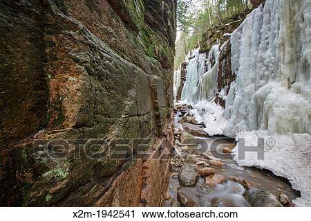 Stock Image - Franconia Notch State Park -Flume Gorge during the spring months in Lincoln, New Hampshire USA.. Fotosearch