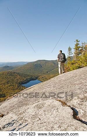 Franconia Notch State Park - Lonesome Lake from Hi-Cannon Trail This trail leads to the summit of Cannon Mountain in the White Mountains, New Hampshire USA View Large Photo Image Stock Image - Franconia Notch State Park - Lonesome Lake from Hi-Cannon Trail This trail leads to the summit of Cannon Mountain in the White Mountains, New Hampshire USA. Fotosearch