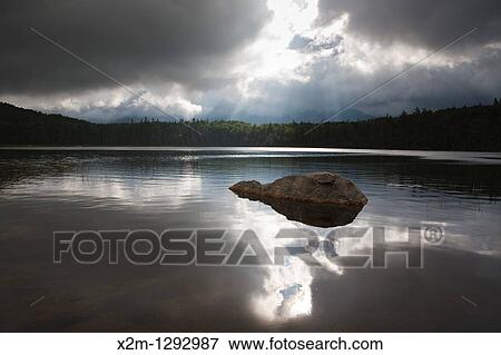Franconia Notch State Park - Lonesome Lake in the White Mountains, New Hampshire USA This lake is located long the Appalachian Trail View Large Photo Image Stock Photo - Franconia Notch State Park - Lonesome Lake in the White Mountains, New Hampshire USA This lake is located long the Appalachian Trail. Fotosearch