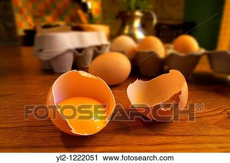 Free range eggs, one cracked with a yoke, in a coutry kitchen setting View Large Photo Image Stock Image - Free range eggs, one cracked with a yoke, in a coutry kitchen setting. Fotosearch