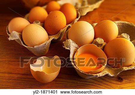 Free range eggs, one cracked with a yoke, in a coutry kitchen setting View Large Photo Image Stock Image - Free range eggs, one cracked with a yoke, in a coutry kitchen setting. Fotosearch