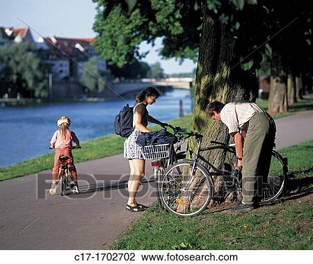 freetime, fitness, bicycles, cyclists, young family View Large Photo Image Stock Image - freetime, fitness, bicycles, cyclists, young family. Fotosearch